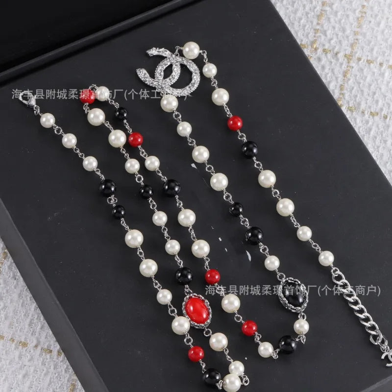 Pearl Necklace With Peach Heart Tassel