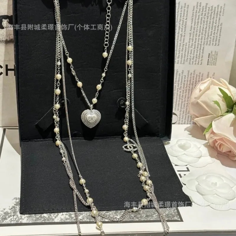 Pearl Necklace With Peach Heart Tassel