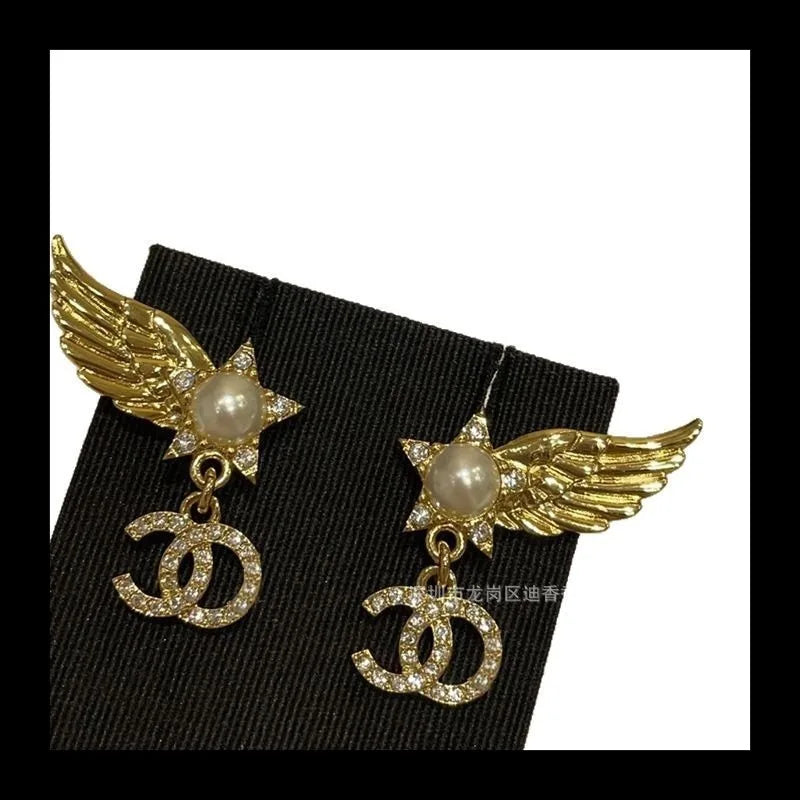 Earrings With Pearl & Wings Diamond Accents
