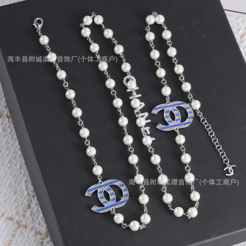Pearl Necklace With Peach Heart Tassel